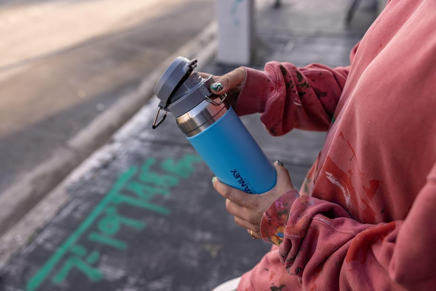 Stanley Quick Flip GO Water Bottle 24 oz | Push Button Lid | Leakproof and Packable for Travel and Sports | Insulated Stainless Steel | BPA-Free | Charcoal
